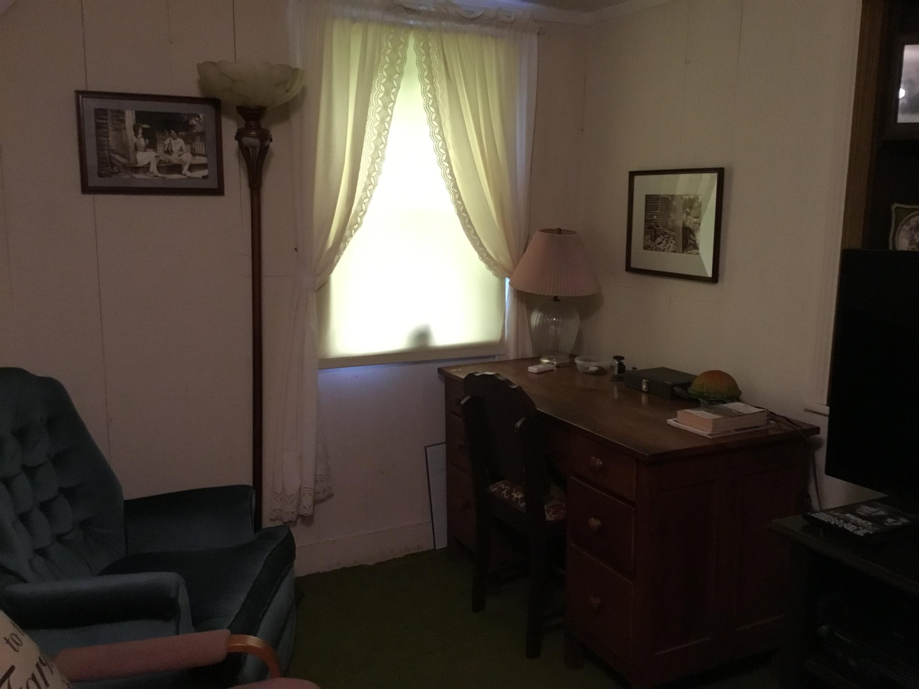 407 J Mallow Road Franklin, WV 26807 - Photo 27 of 39 a view of a workspace with furniture and a window