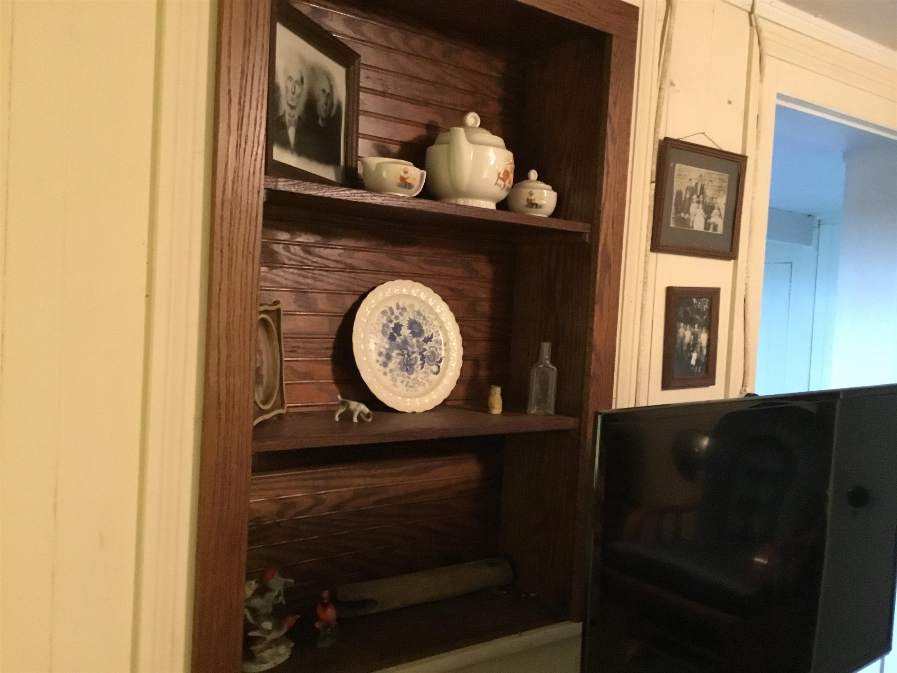 407 J Mallow Road Franklin, WV 26807 - Photo 33 of 39 a close view of a fireplace with a wooden door