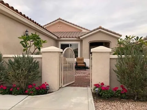 a front view of a house with a porch