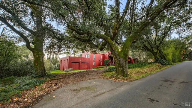 a view of a street with cars