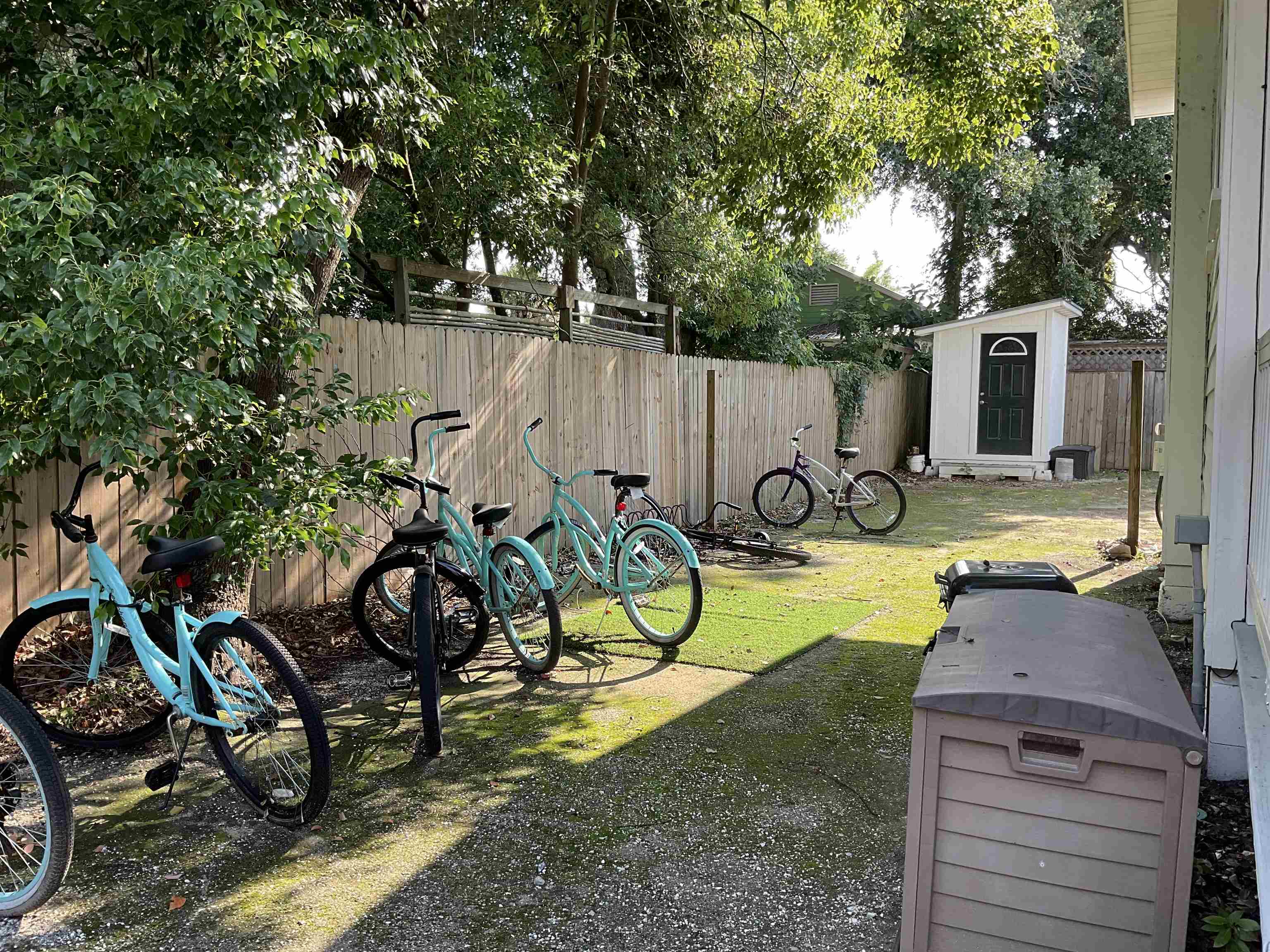 93 Keith Street, Unit A St. Augustine, FL 32084 - Photo 2 of 23 a view of a backyard with table and chairs