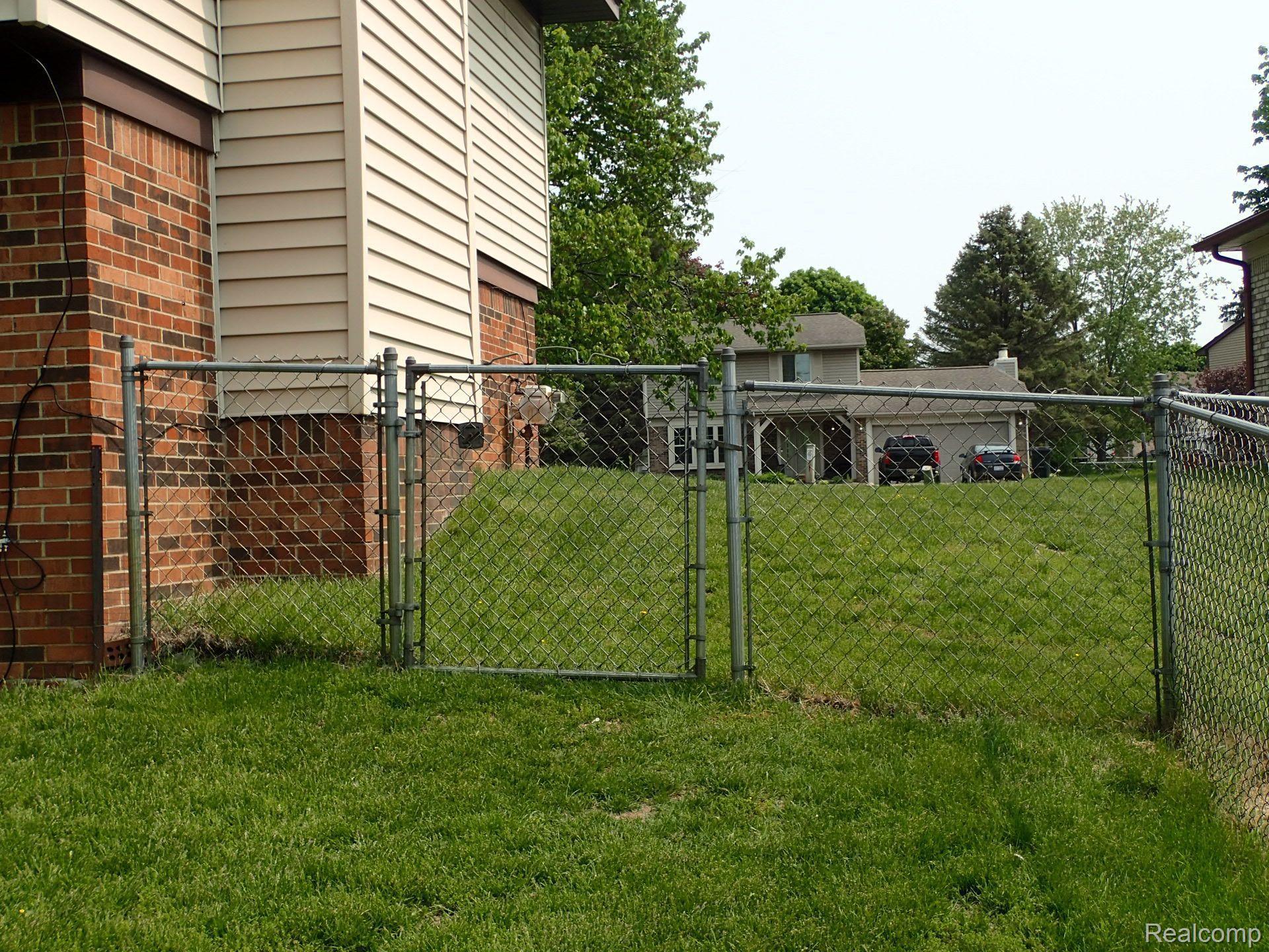 5383 Timber Ridge Trail Clarkston, MI 48346 - Photo 51 of 56 Side yard gate for easy access