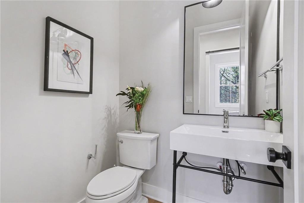 2149 Druid Flds Lane Decatur, GA 30033 - Photo 21 of 25 a bathroom with a toilet a sink and a mirror