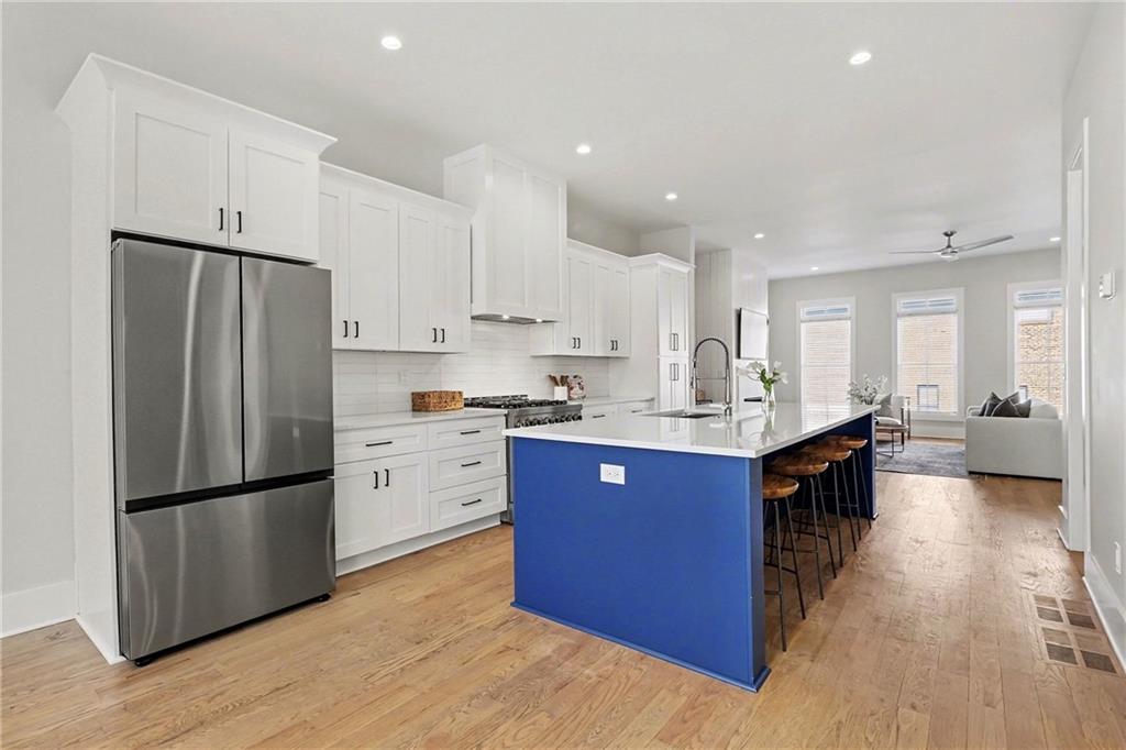 2149 Druid Flds Lane Decatur, GA 30033 - Photo 6 of 25 a large kitchen with stainless steel appliances and refrigerator