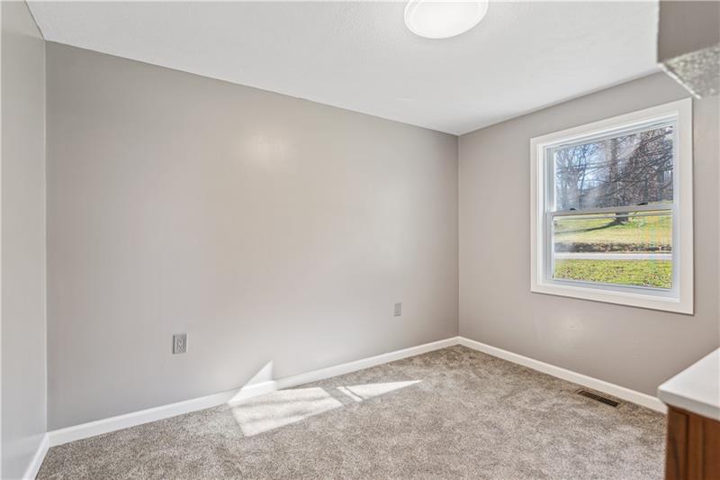 629 Upper Middletown Road Smock, PA 15480 - Photo 23 of 46 a view of an empty room with a window