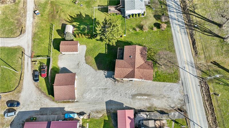 629 Upper Middletown Road Smock, PA 15480 - Photo 7 of 46 an aerial view of houses with outdoor space