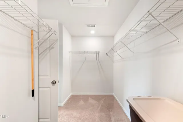a bathroom with a sink and shower