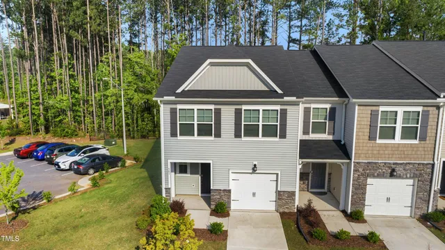 an aerial view of a house with a garden