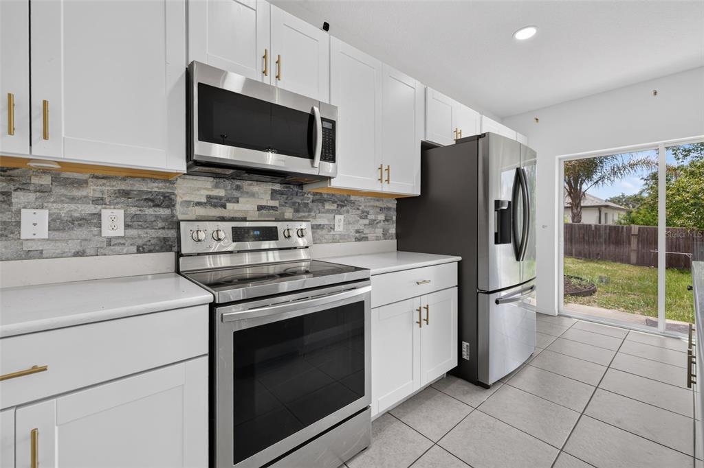 6479 Grapewood Road Spring Hill, FL 34609 - Photo 5 of 24