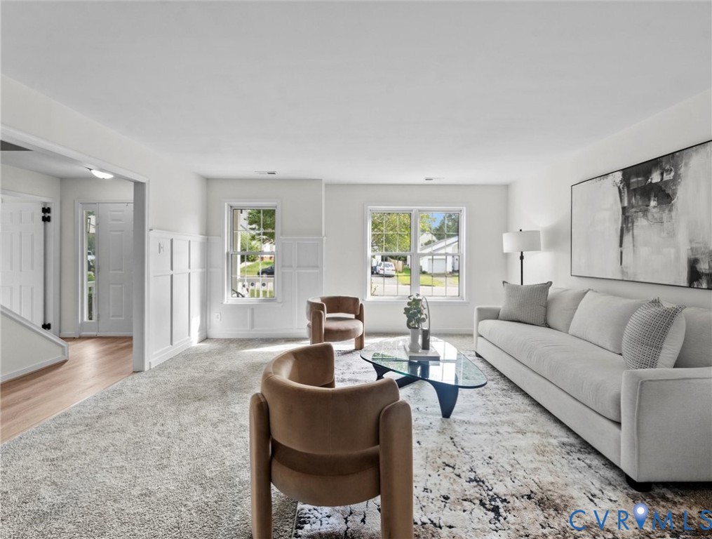 7416 Willow Ridge Terrace Glen Allen, VA 23060 - Photo 11 of 48 a living room with furniture and a large window