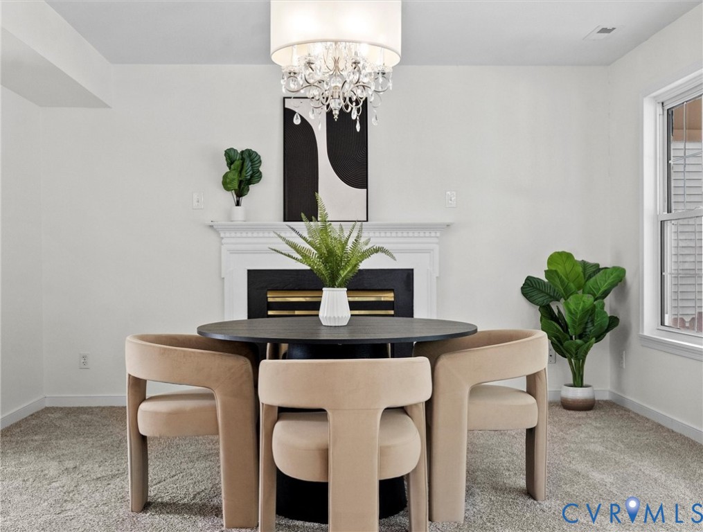 7416 Willow Ridge Terrace Glen Allen, VA 23060 - Photo 15 of 48 a dining room with furniture and potted plant