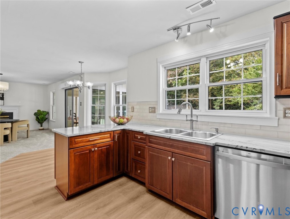 7416 Willow Ridge Terrace Glen Allen, VA 23060 - Photo 20 of 48 a kitchen with sink cabinets and wooden floor