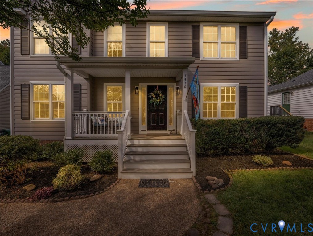 7416 Willow Ridge Terrace Glen Allen, VA 23060 - Photo 2 of 48 a view of a house with potted plants and a yard