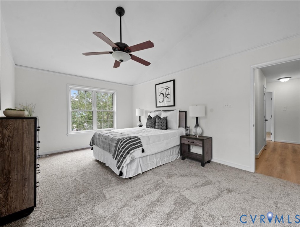 7416 Willow Ridge Terrace Glen Allen, VA 23060 - Photo 28 of 48 a spacious bedroom with a bed and a window