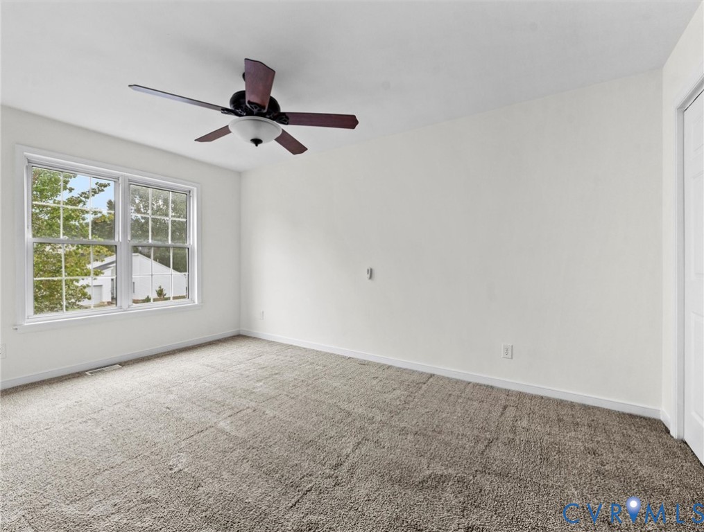 7416 Willow Ridge Terrace Glen Allen, VA 23060 - Photo 37 of 48 an empty room with windows
