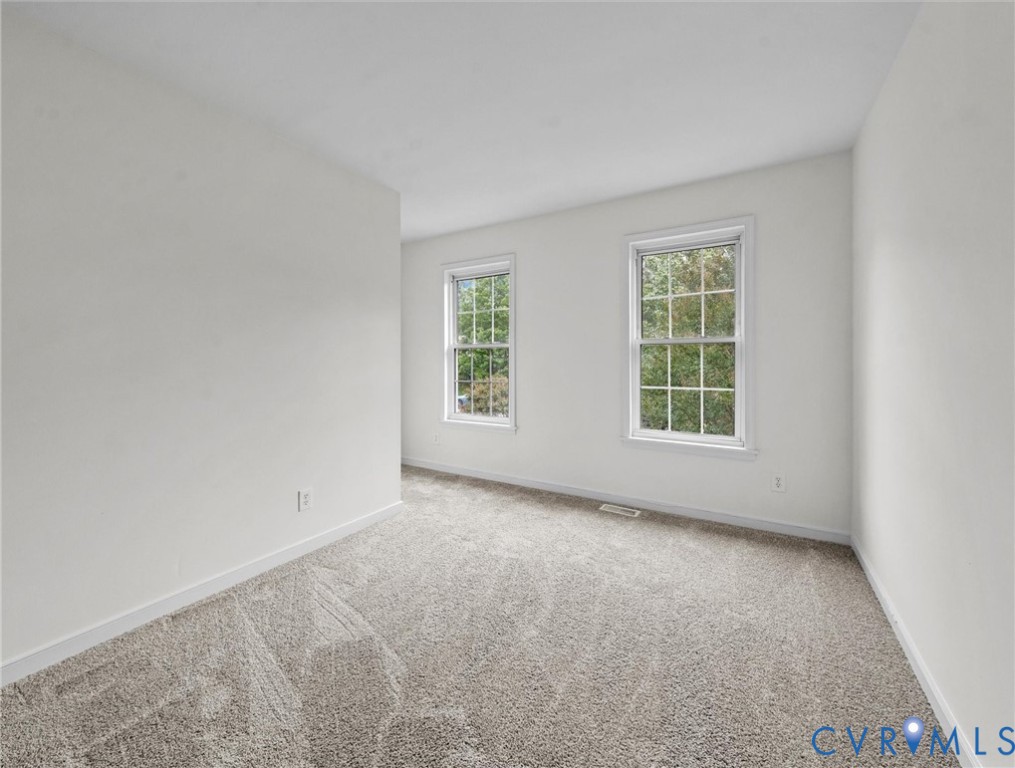 7416 Willow Ridge Terrace Glen Allen, VA 23060 - Photo 39 of 48 an empty room with windows