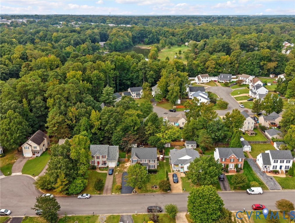 7416 Willow Ridge Terrace Glen Allen, VA 23060 - Photo 47 of 48 an aerial view of residential houses with outdoor space and trees