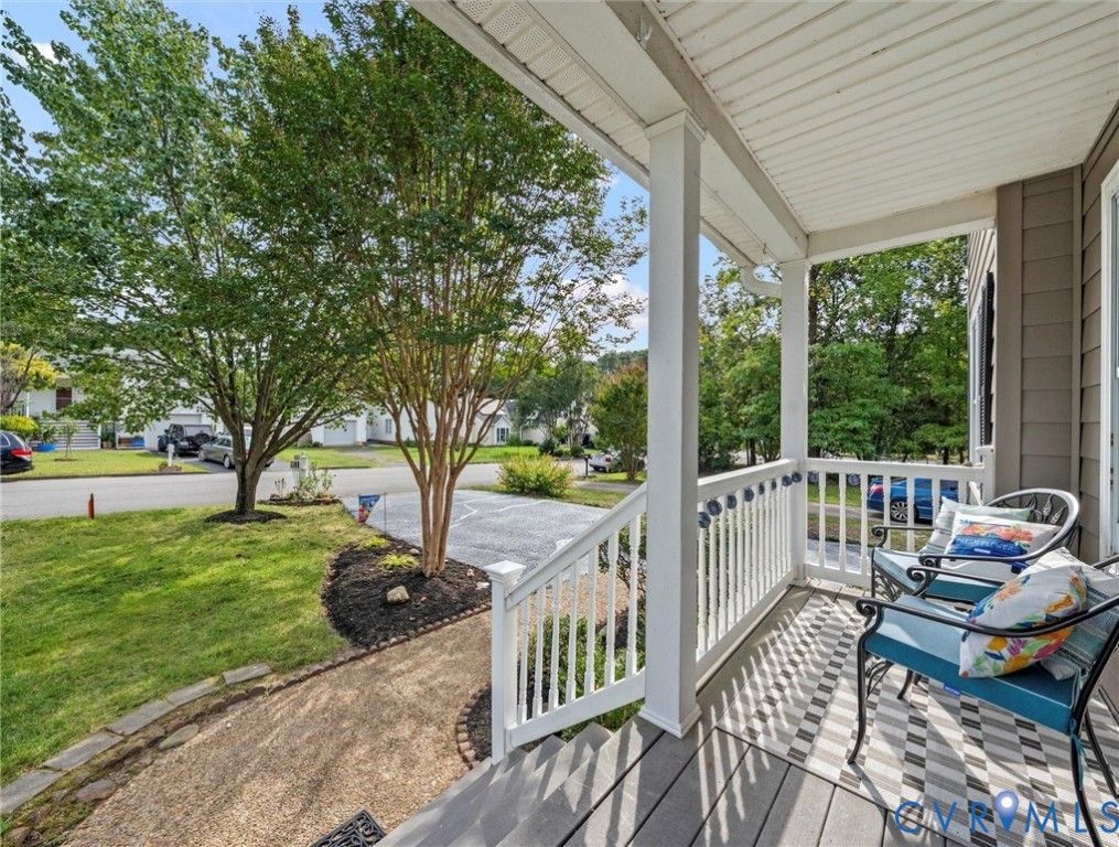 7416 Willow Ridge Terrace Glen Allen, VA 23060 - Photo 6 of 48 a balcony with wooden floor and outdoor seating