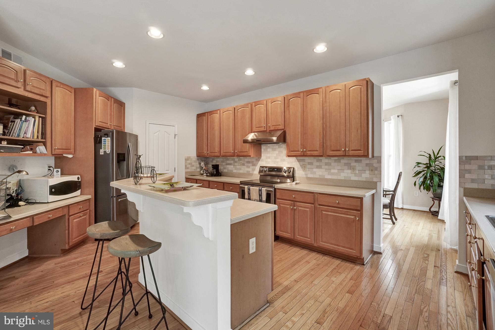 8059 High Castle Road Ellicott City, MD 21043 - Photo 11 of 45 Kitchen with new SS appliances