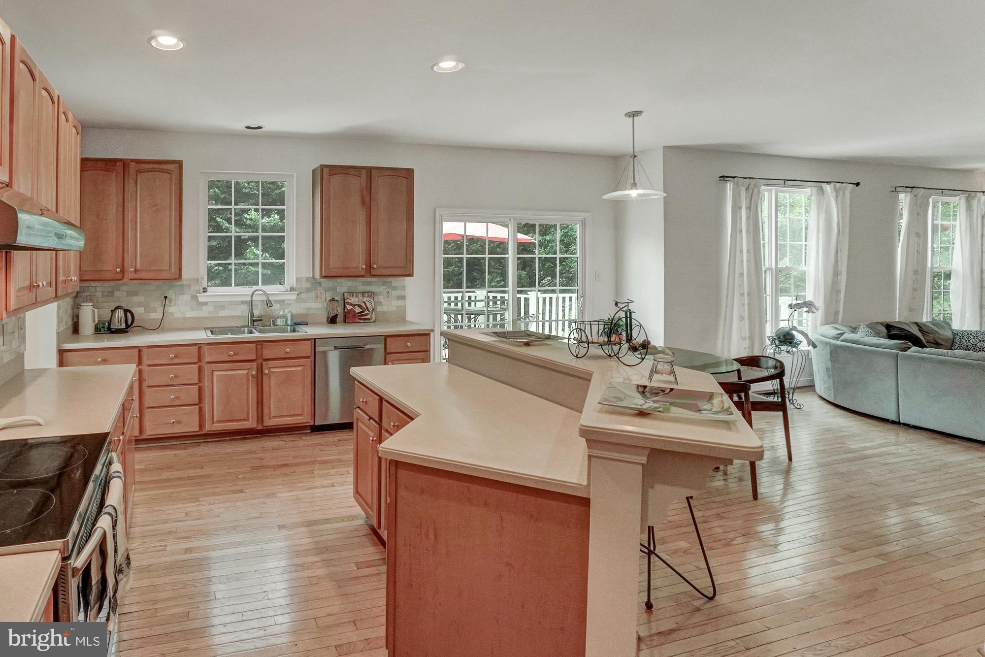 8059 High Castle Road Ellicott City, MD 21043 - Photo 14 of 45 Kitchen with new SS appliances & island