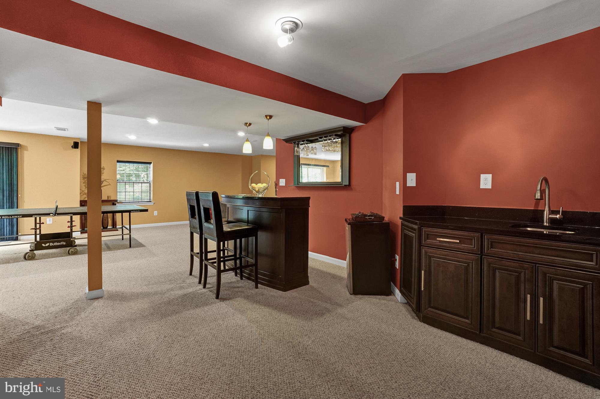 8059 High Castle Road Ellicott City, MD 21043 - Photo 35 of 45 Huge Rec room in walkout lvl basement with bar