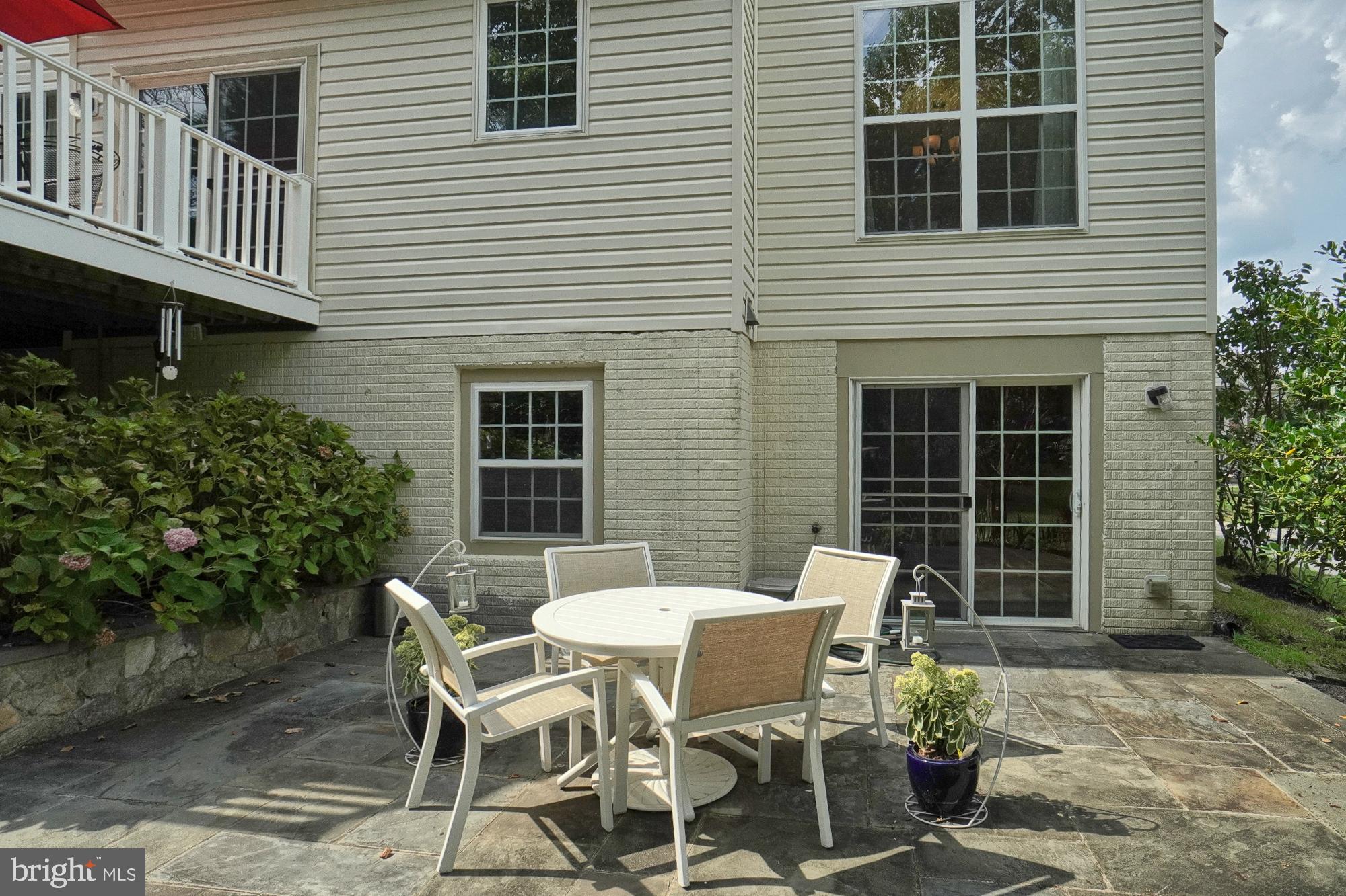 8059 High Castle Road Ellicott City, MD 21043 - Photo 39 of 45 Stone patio with landscaping