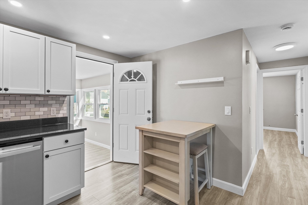 25 Purchase Street Danvers, MA 01923 - Photo 14 of 42 a kitchen with a stove and a refrigerator