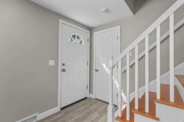 a view of front door with hallway