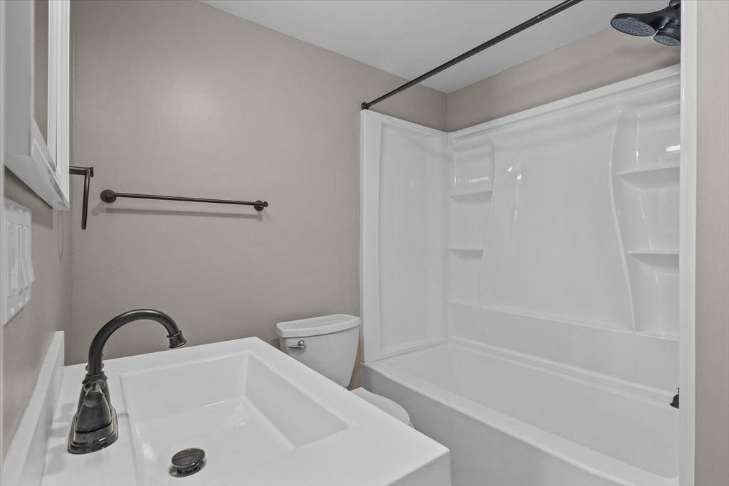 25 Purchase Street Danvers, MA 01923 - Photo 7 of 42 a bathroom with a sink and a tub