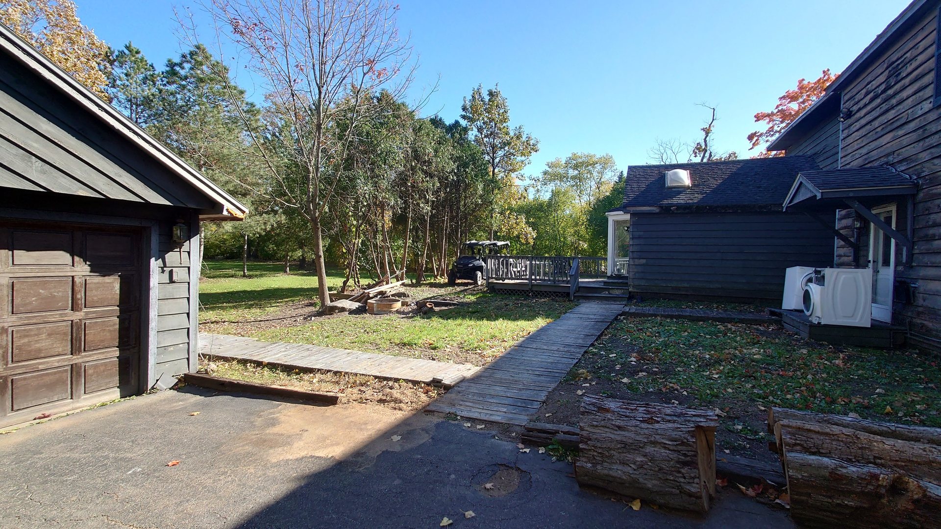 1915 Riverwoods Road Lincolnshire, IL 60069 - Photo 19 of 59 a view of a house with backyard and trees