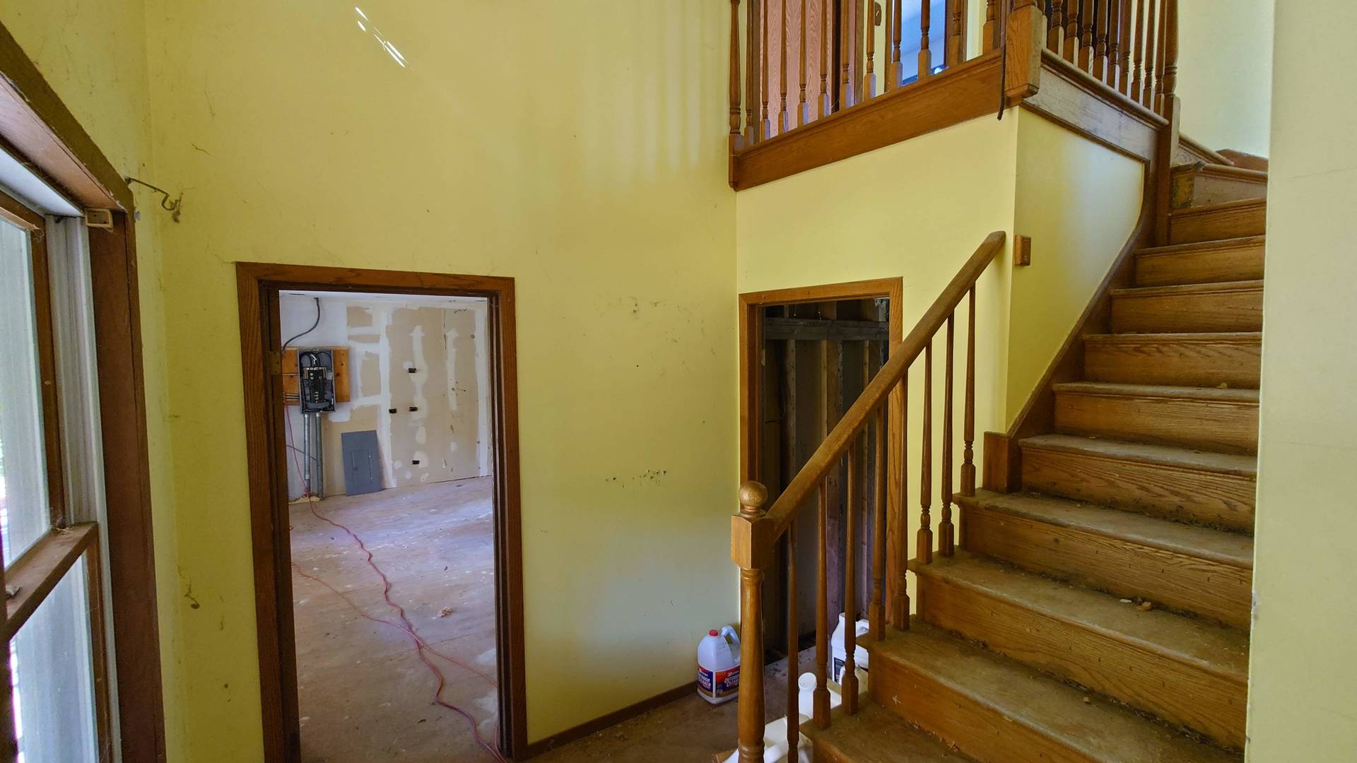1915 Riverwoods Road Lincolnshire, IL 60069 - Photo 42 of 59 a view of a hallway with wooden floor and staircase