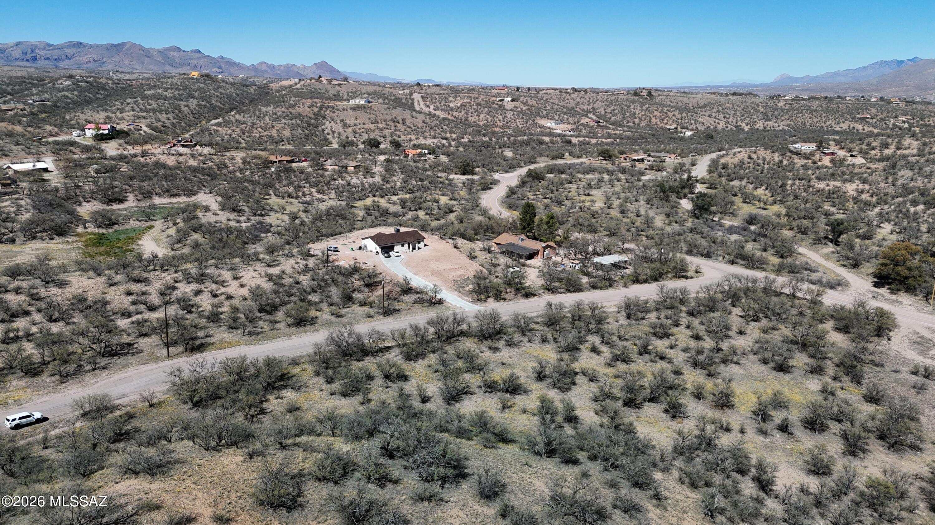561 Mulberry Court, Unit 80 Rio Rico, AZ 85648 - Photo 8 of 13 an aerial view of residential houses with outdoor space and trees