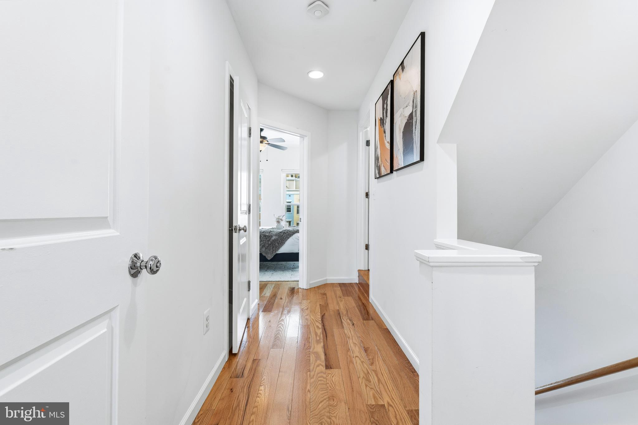 353 L Street Southeast Washington, DC 20003 - Photo 12 of 36 a view of a hallway with wooden floor and staircase