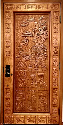 a view of a swimming pool and lounge chairs