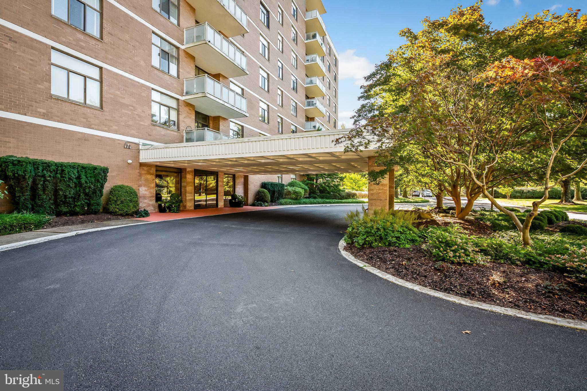 1 Slade Avenue, Unit 203 Baltimore, MD 21208 - Photo 3 of 17 a view of a building with a yard