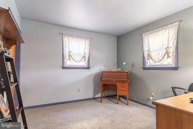 a room with furniture and a window