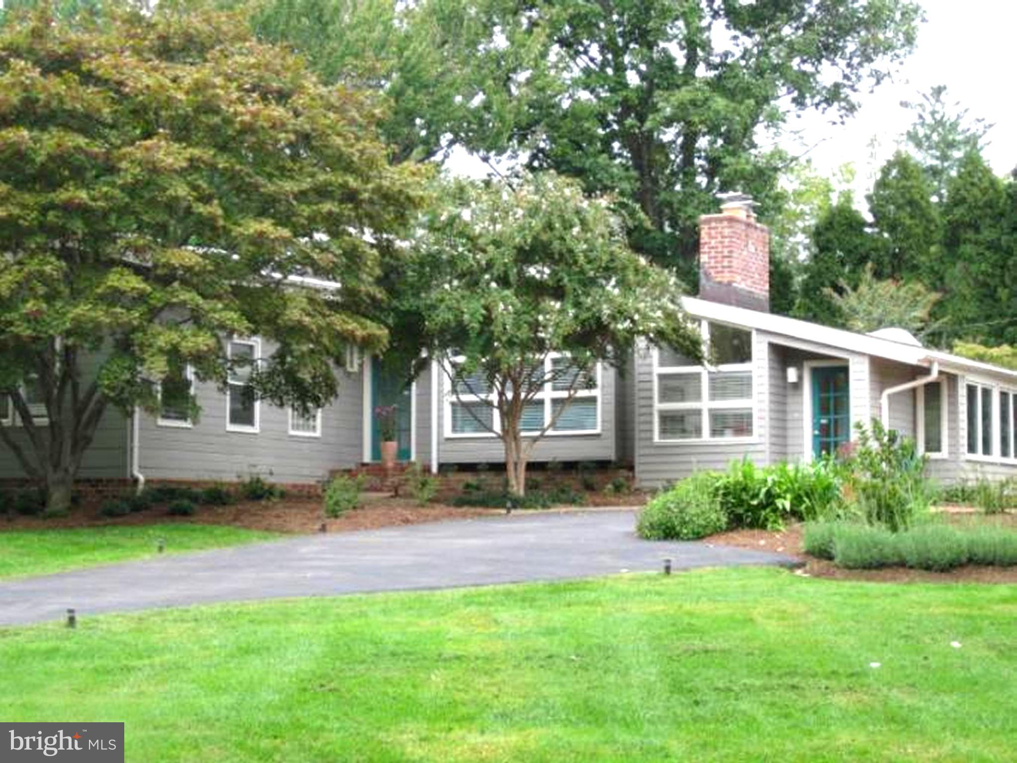 11001 Brent Road Potomac, MD 20854 - Photo 2 of 23 a house with garden in front of it