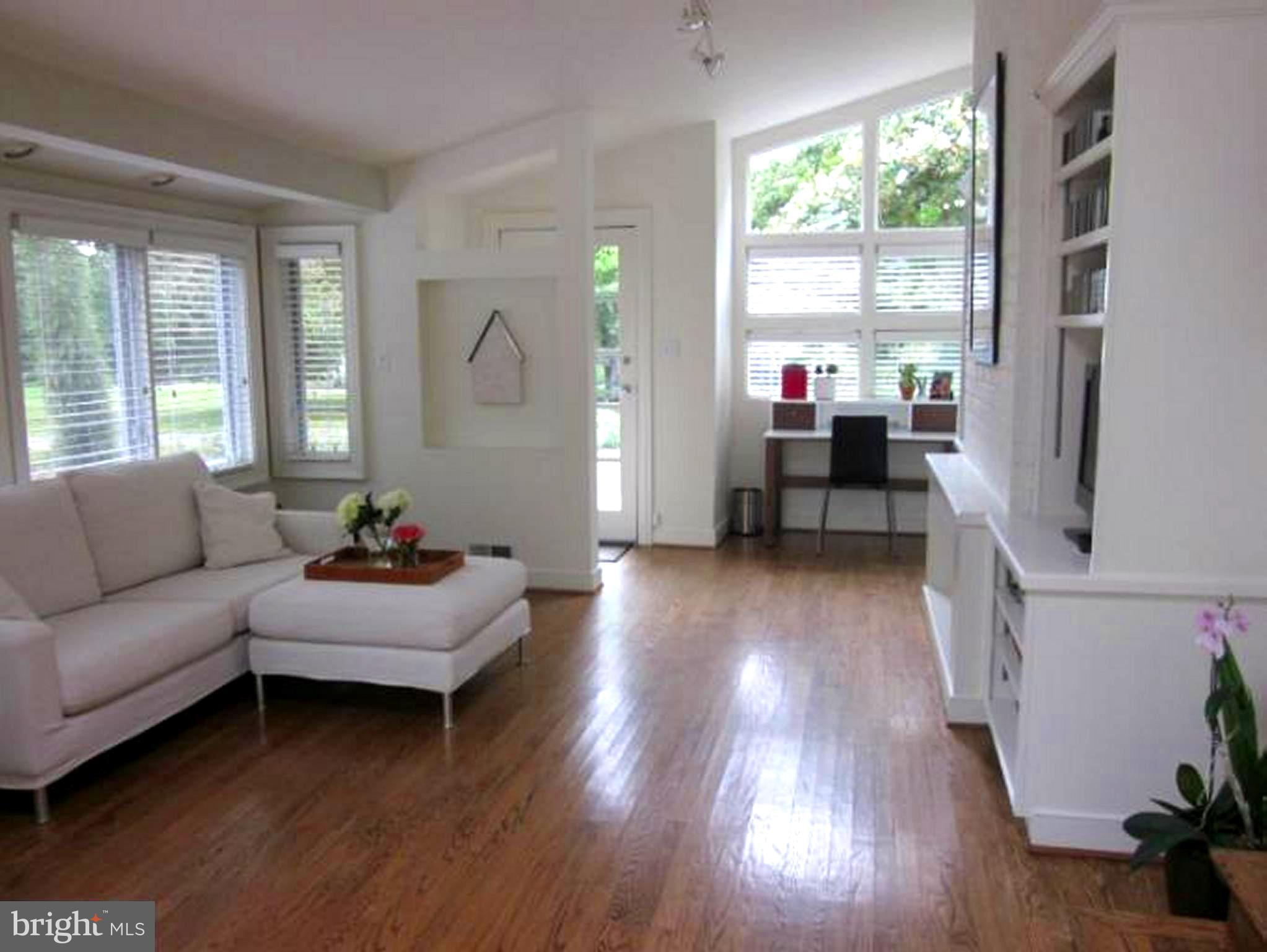 11001 Brent Road Potomac, MD 20854 - Photo 13 of 23 a living room with furniture and a wooden floor