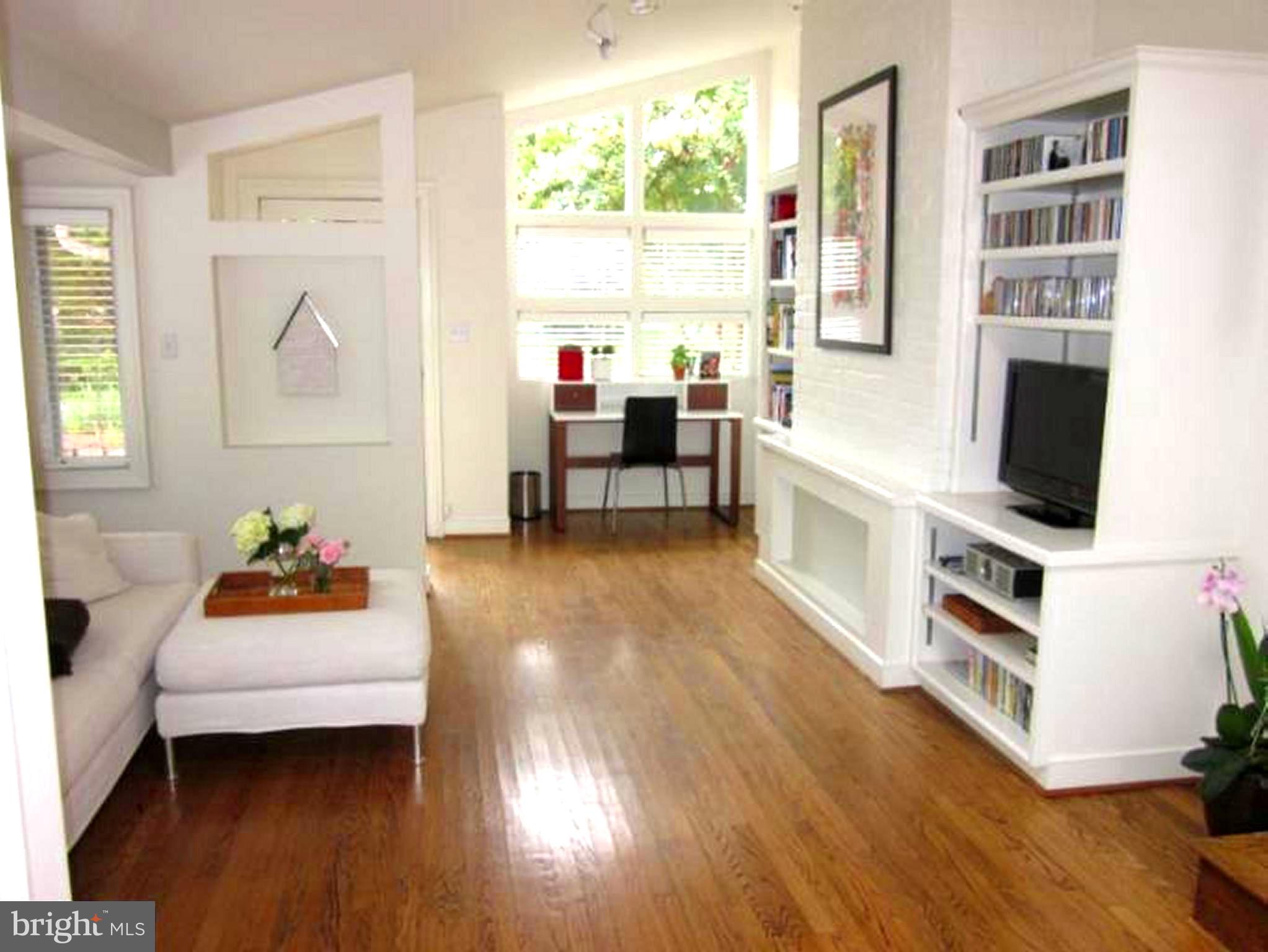 11001 Brent Road Potomac, MD 20854 - Photo 14 of 23 a living room with furniture and a flat screen tv