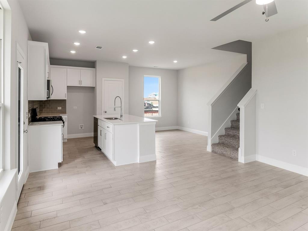 427 Magellan Road Seagoville, TX 75159 - Photo 13 of 25 a view of kitchen with wooden floor and electronic appliances
