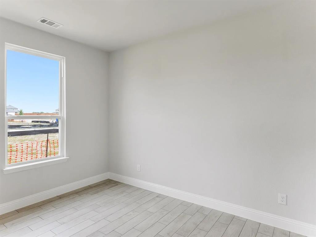 427 Magellan Road Seagoville, TX 75159 - Photo 19 of 25 a view of a room that has a window in it