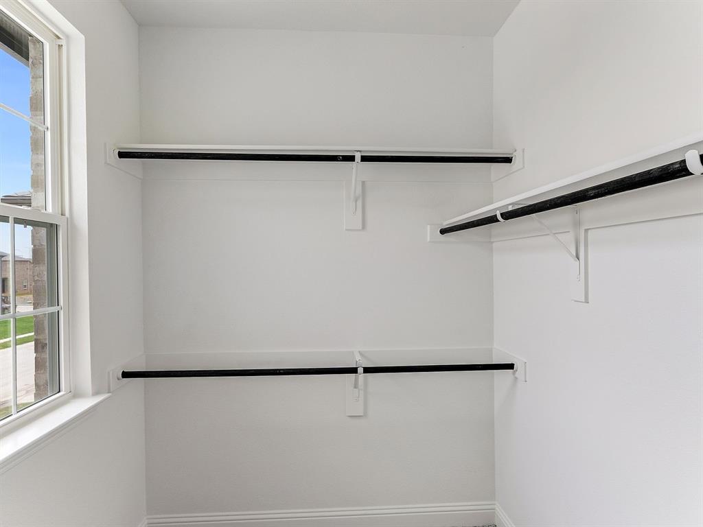 427 Magellan Road Seagoville, TX 75159 - Photo 22 of 25 a view of a refrigerator in kitchen