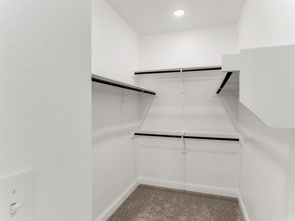 427 Magellan Road Seagoville, TX 75159 - Photo 25 of 25 a view of a refrigerator in kitchen