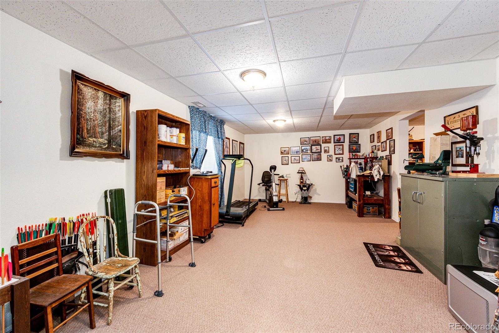 4420 Behrens Road Byers, CO 80103 - Photo 17 of 39 a view of a room with gym equipment