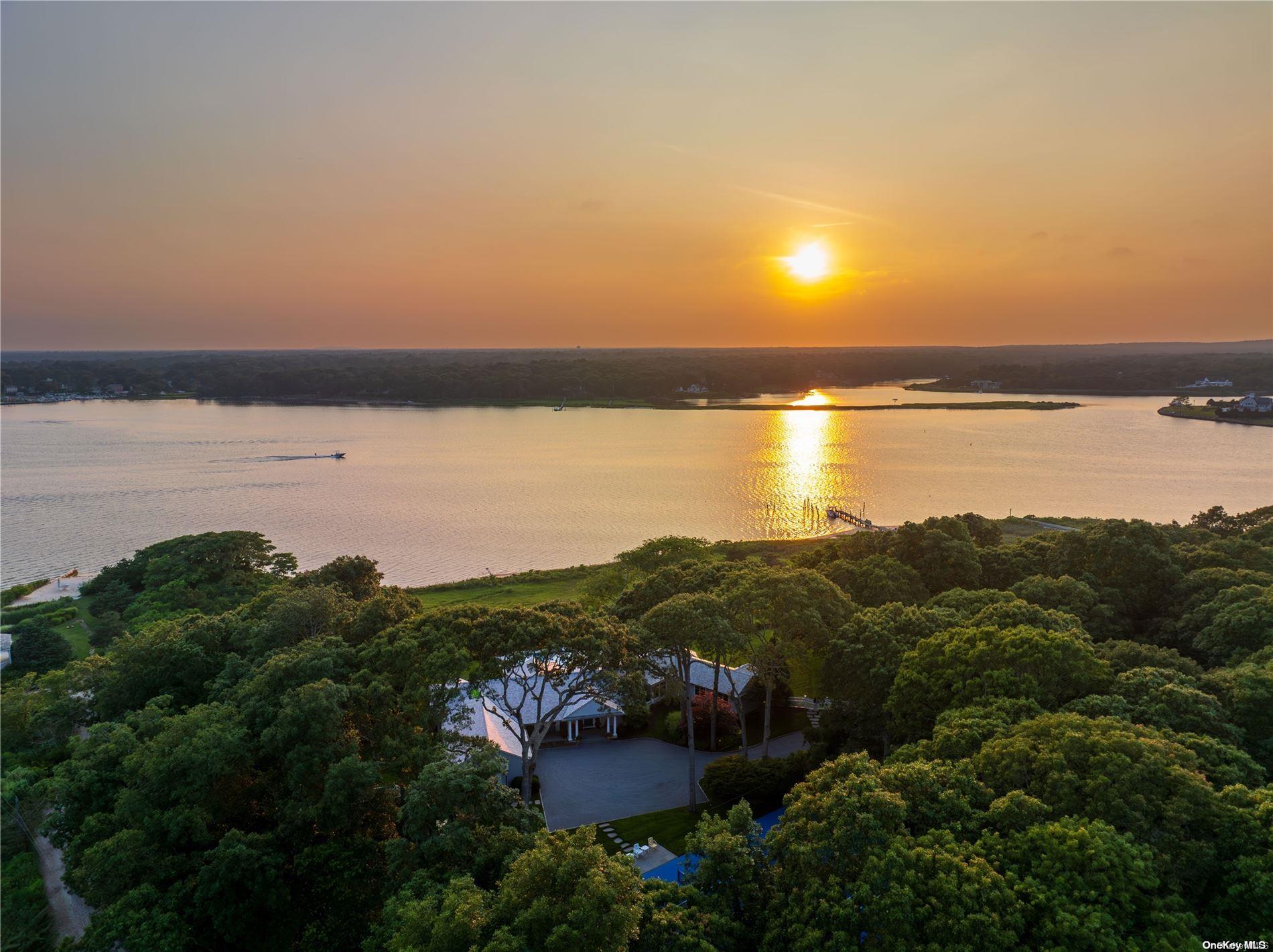 86 Cedar Lane Remsenburg, NY 11960 - Photo 1 of 1 a view of lake and mountain