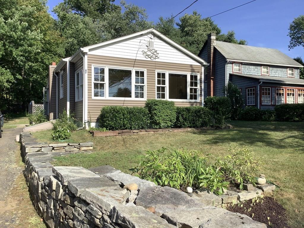47 Union Road Wales, MA 01081 - Photo 11 of 11 a front view of a house with garden
