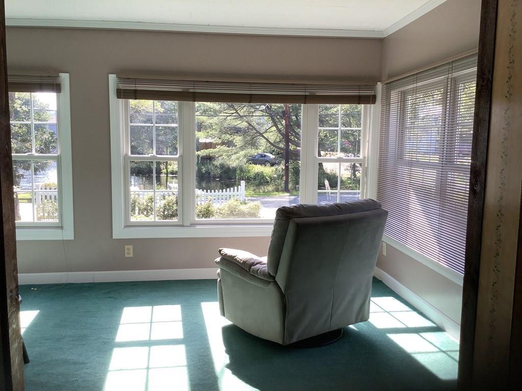 47 Union Road Wales, MA 01081 - Photo 5 of 11 a living room with a large window
