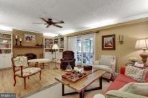 2875 Lehigh Road York, PA 17402 - Photo 8 of 36 FR with WB FPL and BI cabinetry. Wood floor