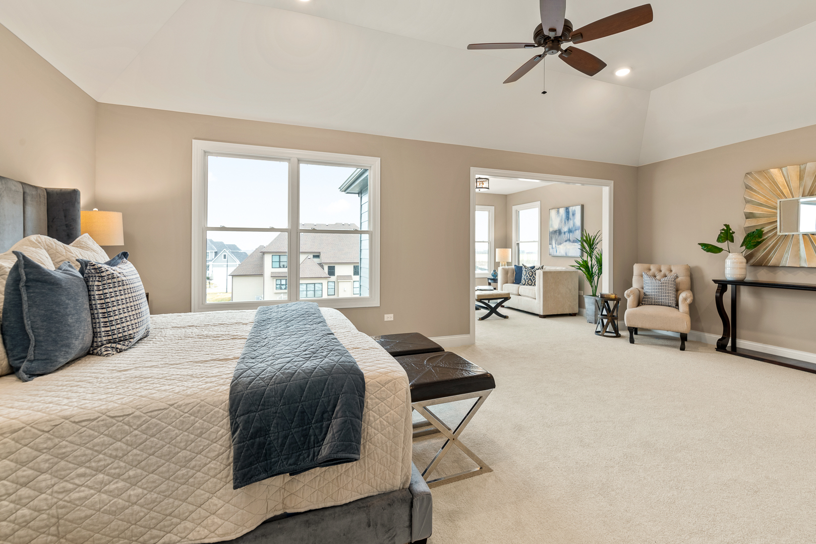 4475 Sassafras Lane Naperville, IL 60564 - Photo 18 of 24 a bedroom with a bed couch and a large window