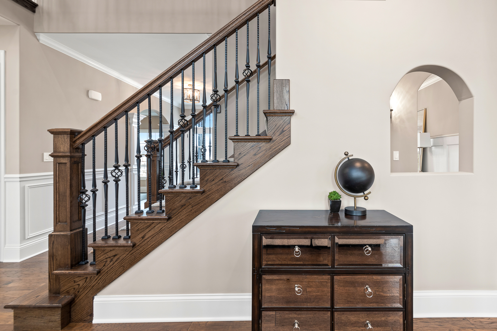 4475 Sassafras Lane Naperville, IL 60564 - Photo 6 of 24 a view of a hallway with wooden floor and staircase